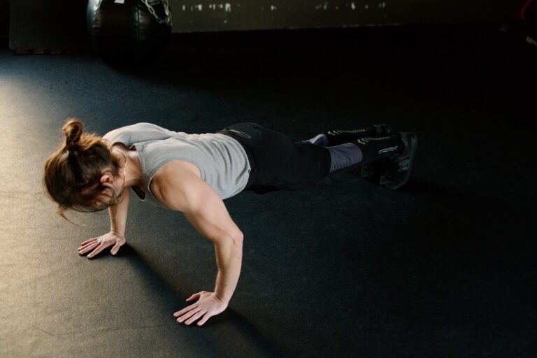 Person building strength gradually before attempting a high-volume workout