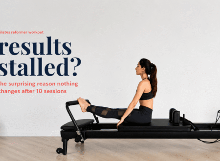 Pilates reformer workout results stalled, woman performing footwork exercise on a reformer machine in a bright studio