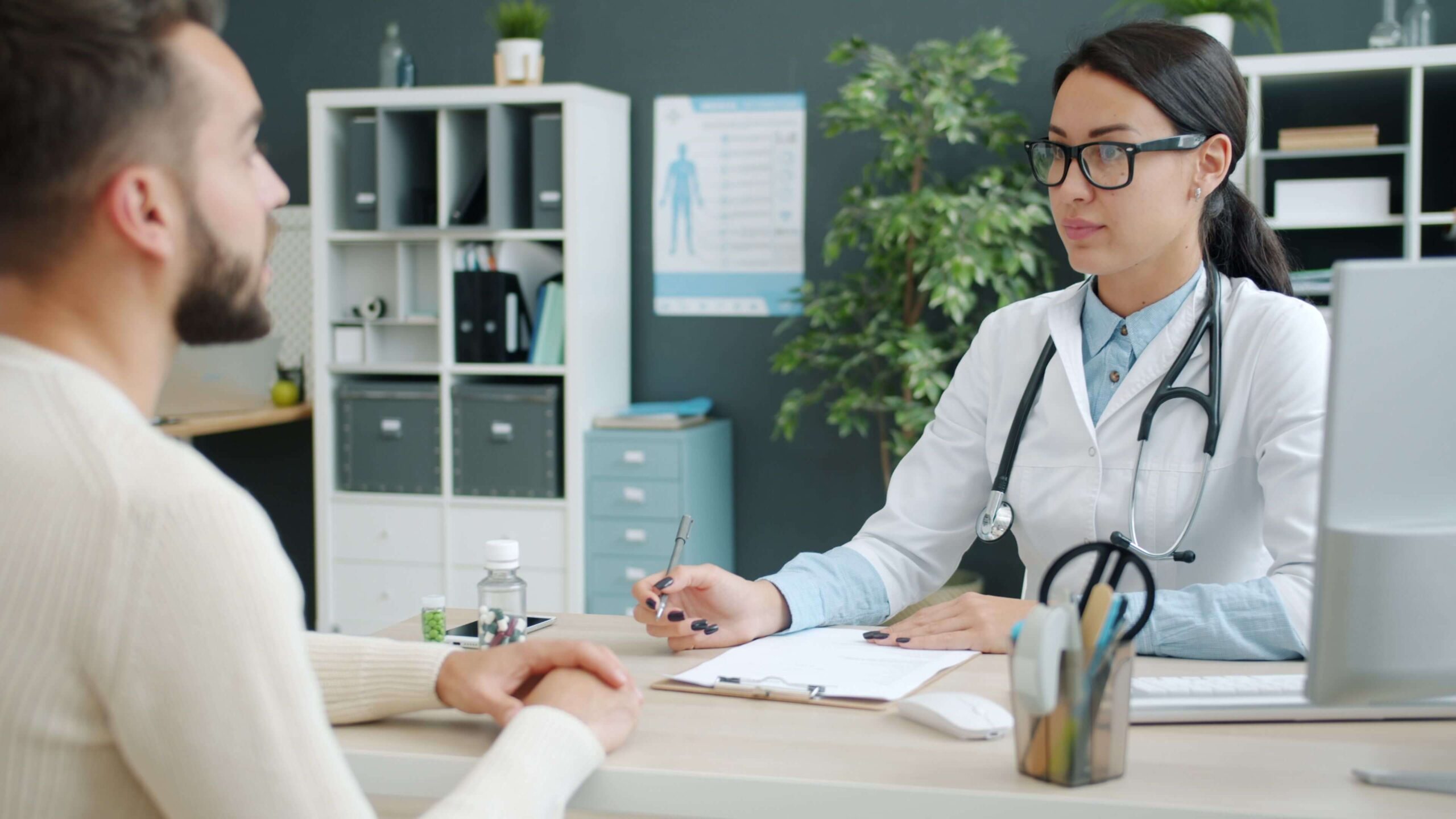 Man consulting with a doctor about a health concern